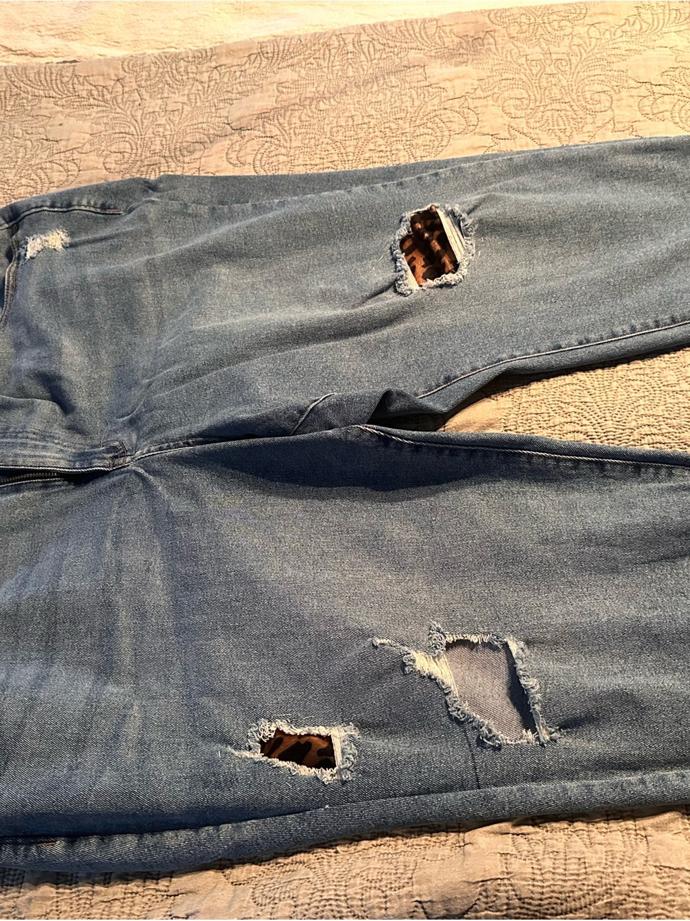 Distressed Blue Denim Jeans